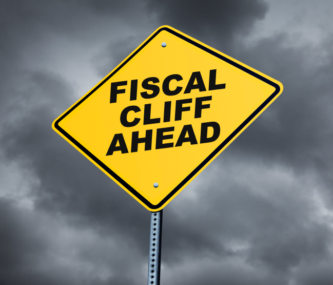 Road warning sign on fiscal cliff