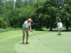 Man playing golf